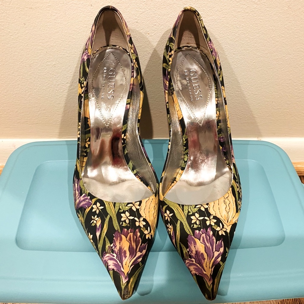 Guess brand, Heel size 4inch. Shoe size 8.5.